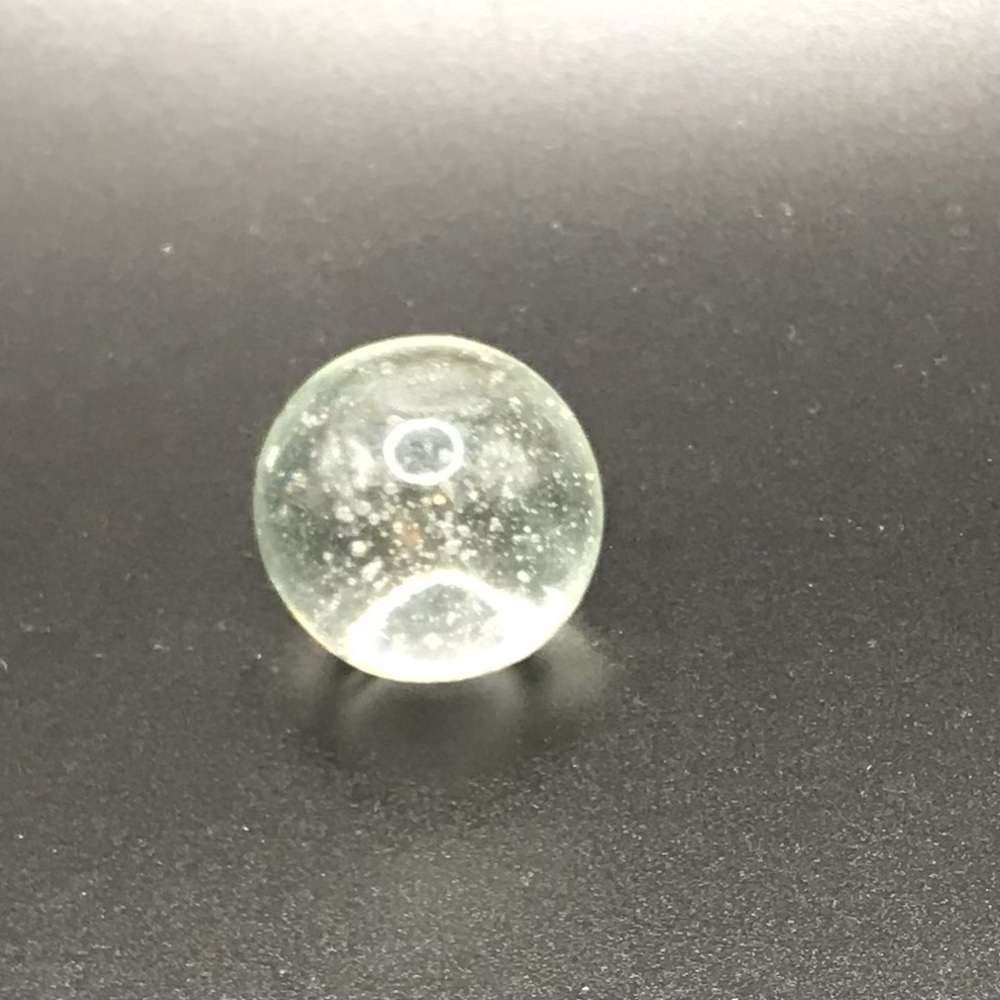 Single clear 1" art glass shooter marble bubble -has defect in glass